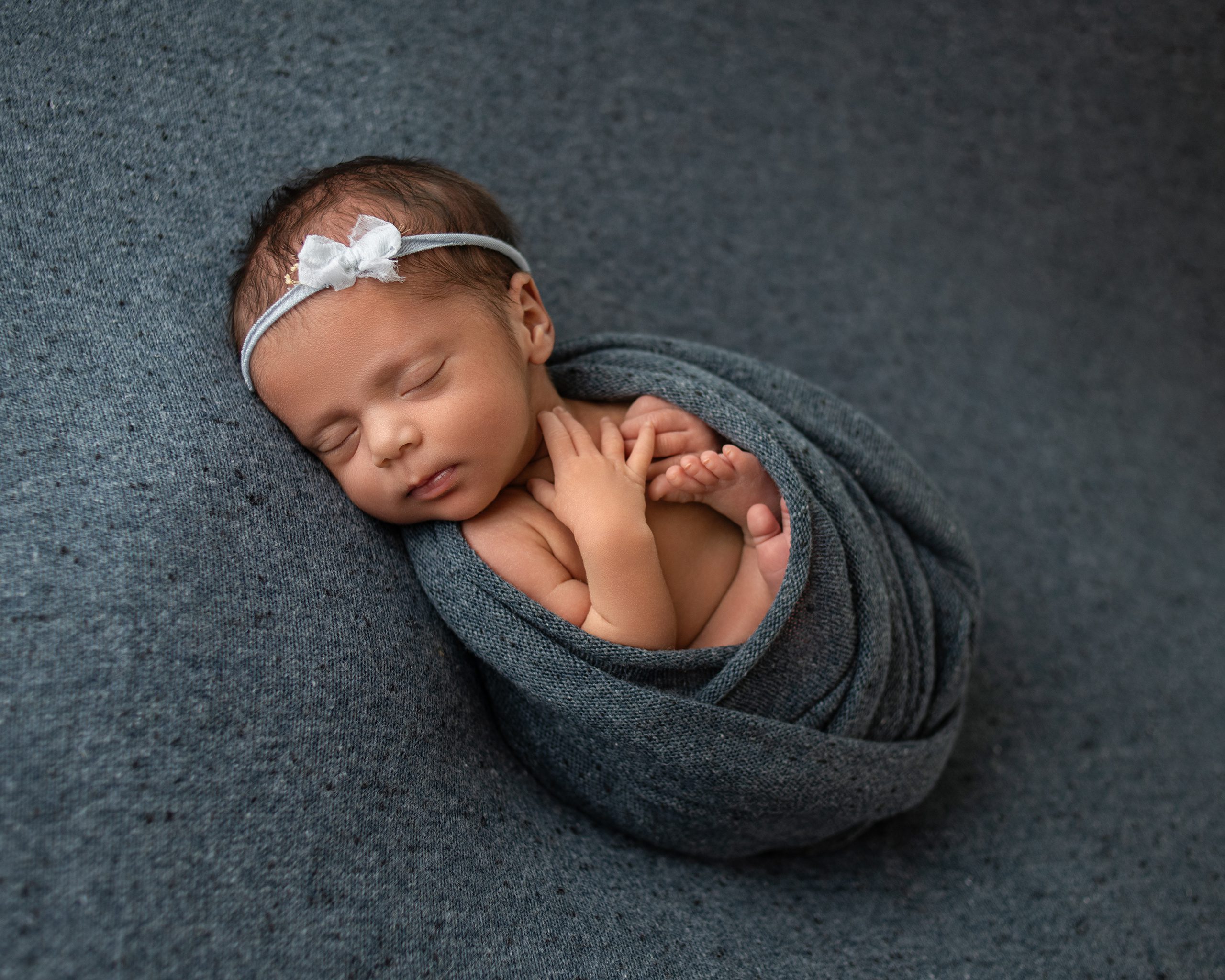 Studio newborn photography session for a growing family in San Marcos